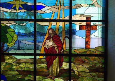 Tulsa Hills Baptist - Jesus holding lamb stained glass